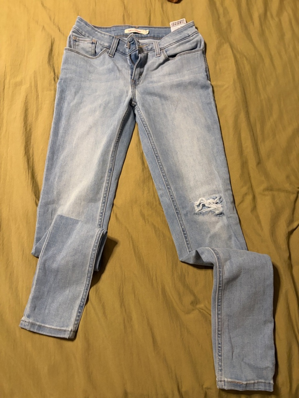 Levi's Light Blue Distressed Skinny Jeans